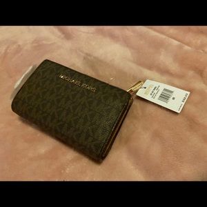 ~SOLD~NEW Michael Kors Foldable wallet